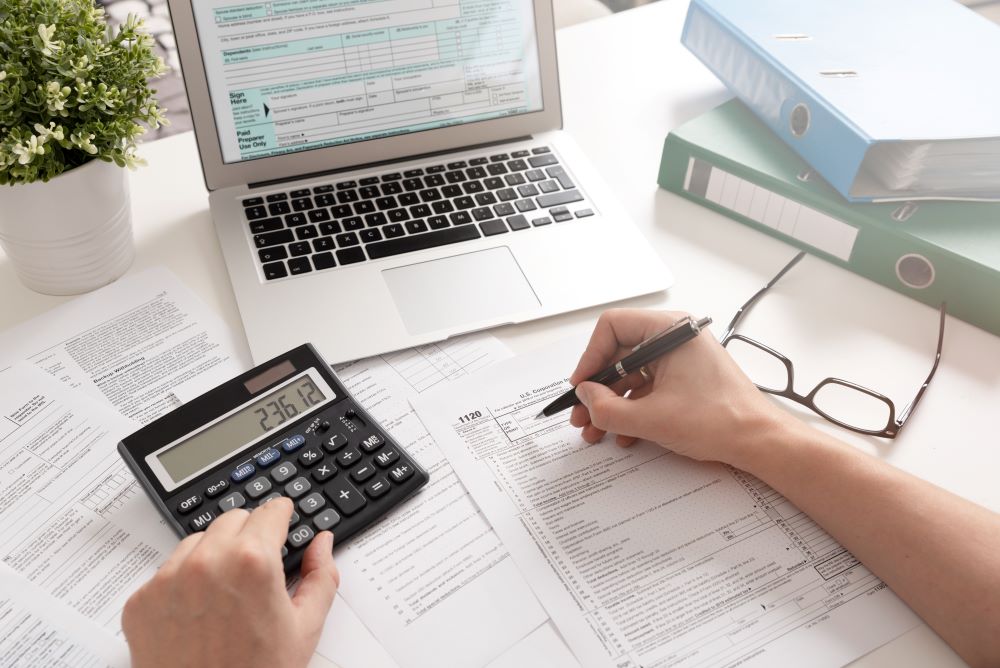 tax documents and calculator